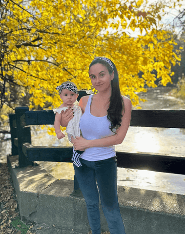 Little girl and mom are wearing matching mommy and me head wraps from By Bella Boutique, Little girl and mom are wearing matching mommy and me head wraps from By Bella Boutique,