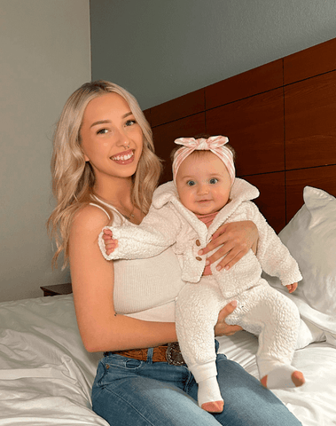 Baby girl is wearing a soft baby headband for little girls from By Bella Boutique. Baby girl is wearing a soft baby headband for little girls from By Bella Boutique.