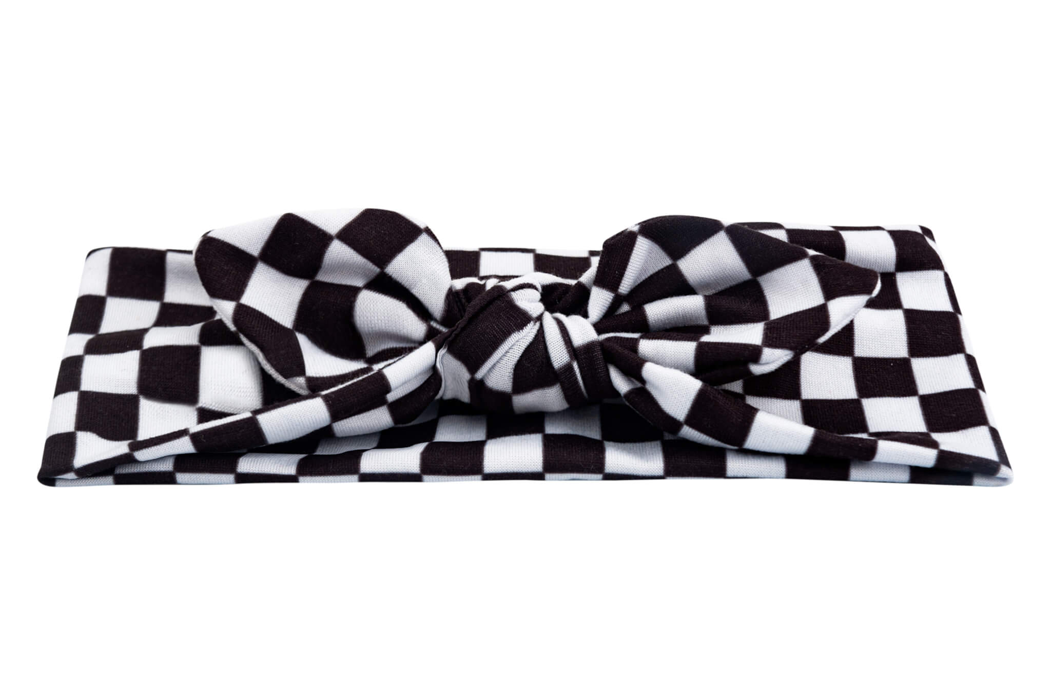 A baby head wrap for little girls featuring a white checkerboard pattern from By Bella Boutique. A baby head wrap for little girls featuring a white checkerboard pattern from By Bella Boutique.