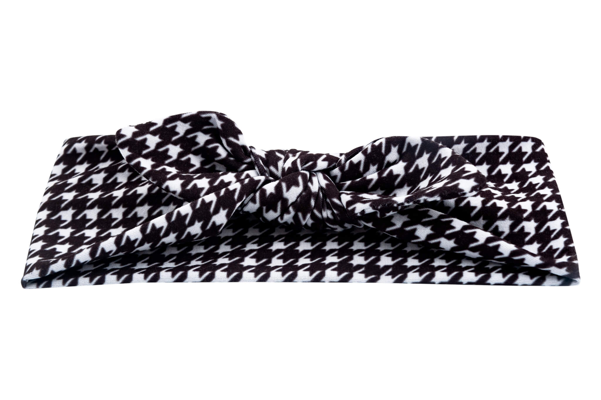 Houndstooth baby headband for girls from By Bella Boutique. Houndstooth baby headband for girls from By Bella Boutique.