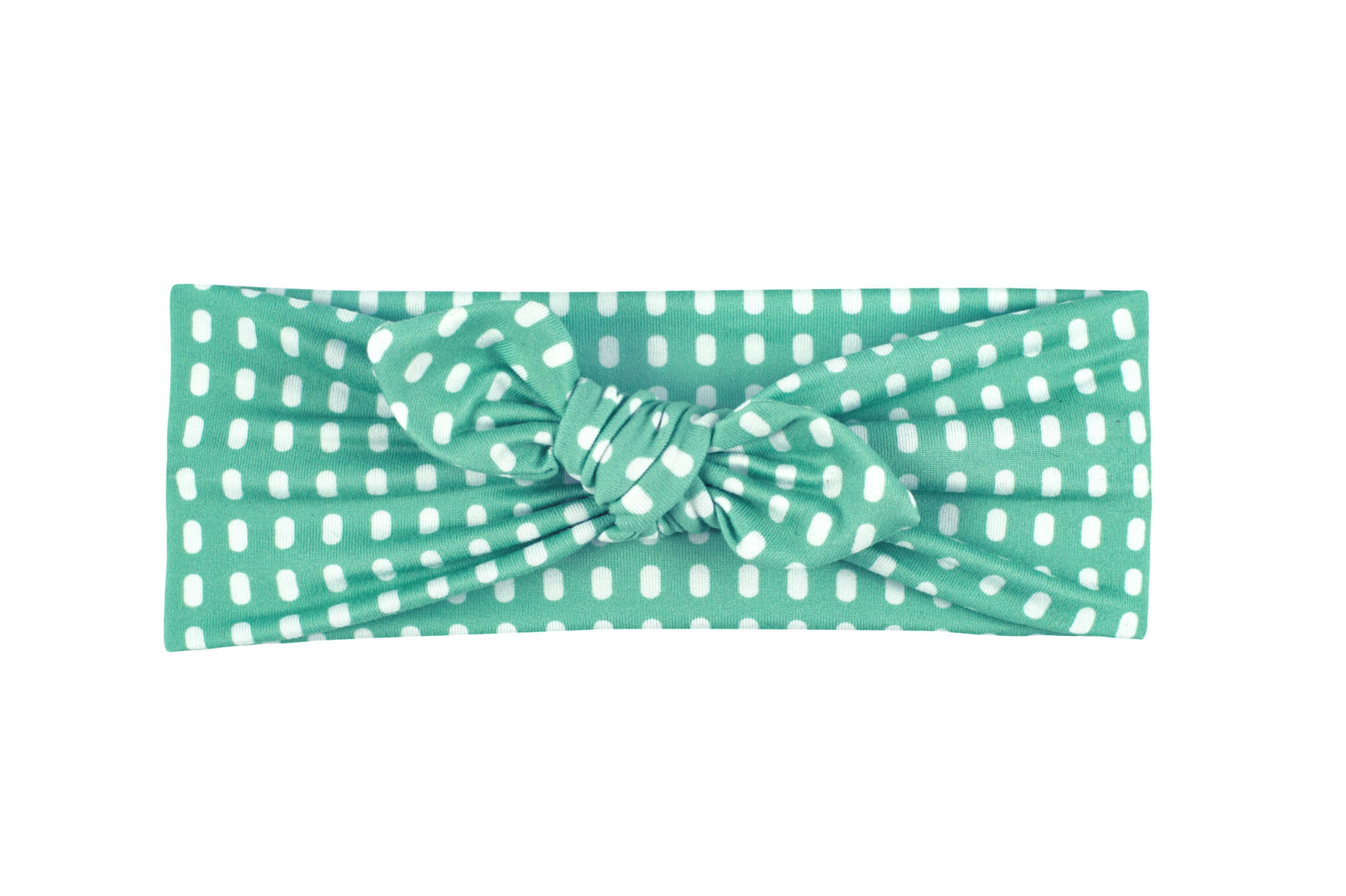 A knotted head wrap for little girls featuring a dot pattern from By Bella Boutique. A knotted head wrap for little girls featuring a dot pattern from By Bella Boutique.