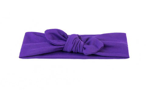 A purple knot head wrap for babies from By Bella Boutique.  A purple knot head wrap for babies from By Bella Boutique.