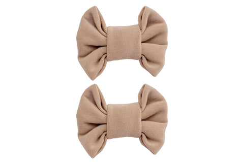 A pair of two handmade bow clips for little girls from By Bella Boutique. A pair of two handmade bow clips for little girls from By Bella Boutique.