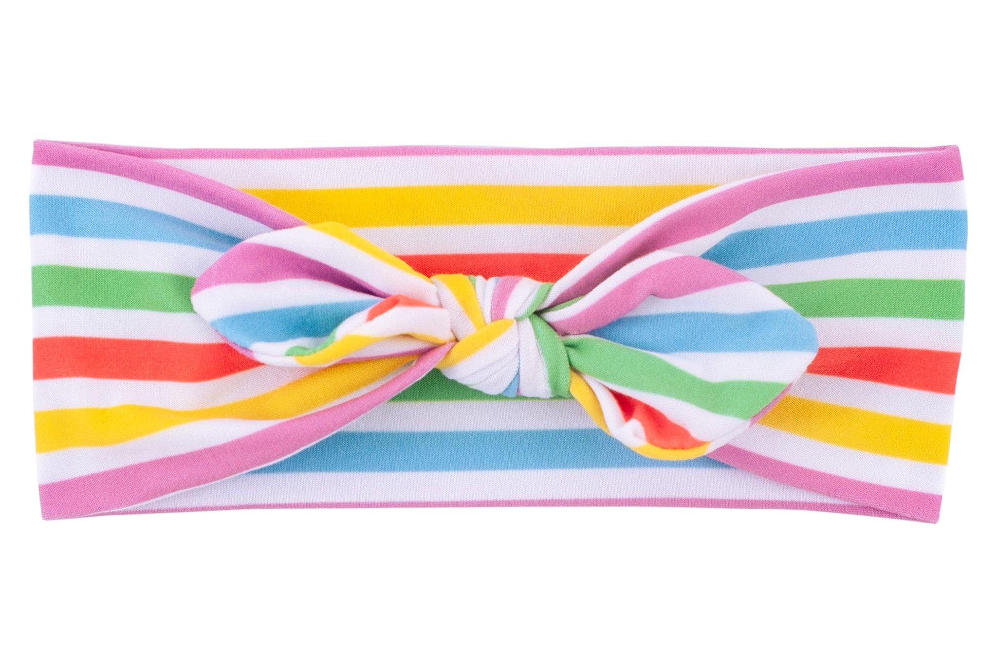 A handmade knotted head wrap for baby girls from By Bella Boutique. A handmade knotted head wrap for baby girls from By Bella Boutique.