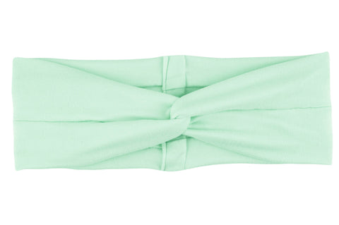 A green mommy and me matching headband from By Bella Boutique. A green mommy and me matching headband from By Bella Boutique.
