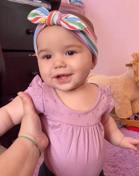 Baby girl is wearing the most comfortable headband for little girls from By Bella Boutique. Baby girl is wearing the most comfortable headband for little girls from By Bella Boutique.