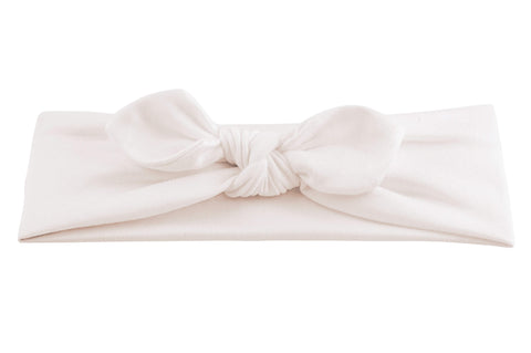White baby head wrap for girls from By Bella Boutique. White baby head wrap for girls from By Bella Boutique.