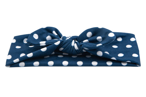 Blue polka dot headband for little girls from By Bella Boutique. Blue polka dot headband for little girls from By Bella Boutique.