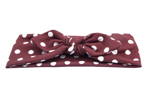 Brown polka dot print headwrap with bows for babies from By Bella Boutique. Brown polka dot print headwrap with bows for babies from By Bella Boutique.
