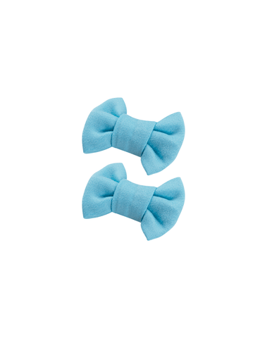 Handmade set of 2 soft aqua blue bow clips angle view for toddlers and little girls by By Bella Boutique