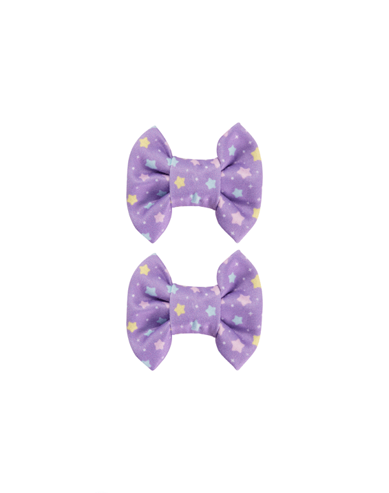 Handmade set of 2 soft purple pastel star print bow clips front view for toddlers and little girls by By Bella Boutique