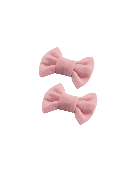 Handmade set of 2 soft peach pink bow clips side angle view for babies toddlers and little girls by By Bella Boutique