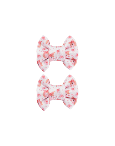 Handmade set of 2 soft white watercolor unicorn print bow clips front view for toddlers and little girls by By Bella Boutique