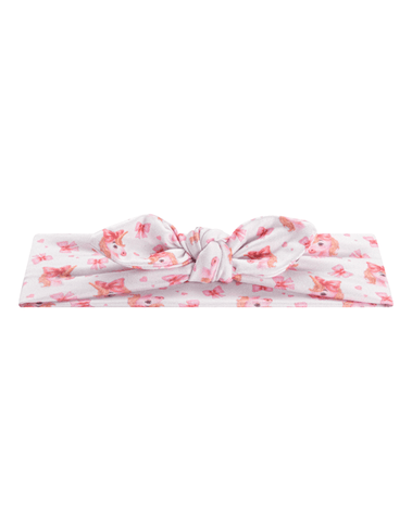 Handmade soft stretchy white watercolor unicorn and hearts print headband angle view for babies and toddlers by By Bella Boutique