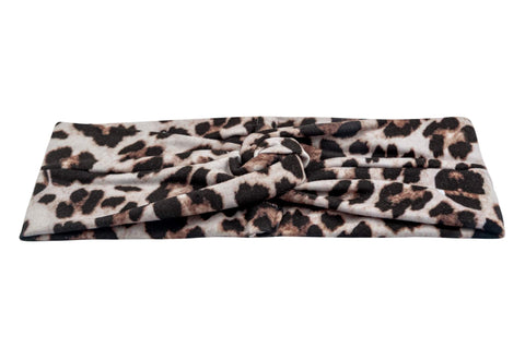 A turban headband featuring a leopard print for women from By Bella Boutique.