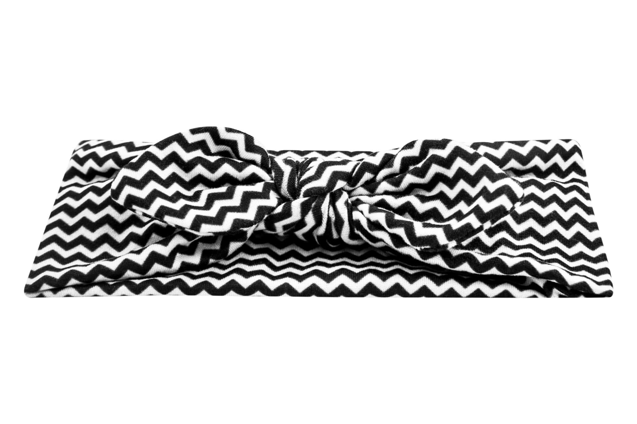 A baby headband featuring a white and black chevron print pattern for little girls from By Bella Boutique.