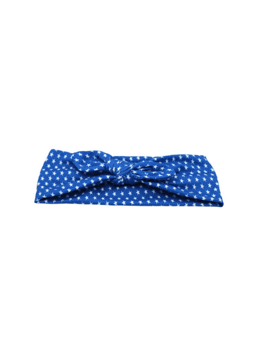 A knotted head wrap featuring a fourth of july pattern for little girls from By Bella Boutique.