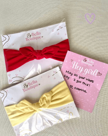 A set of two baby head wraps for little girls from By Bella Boutique.