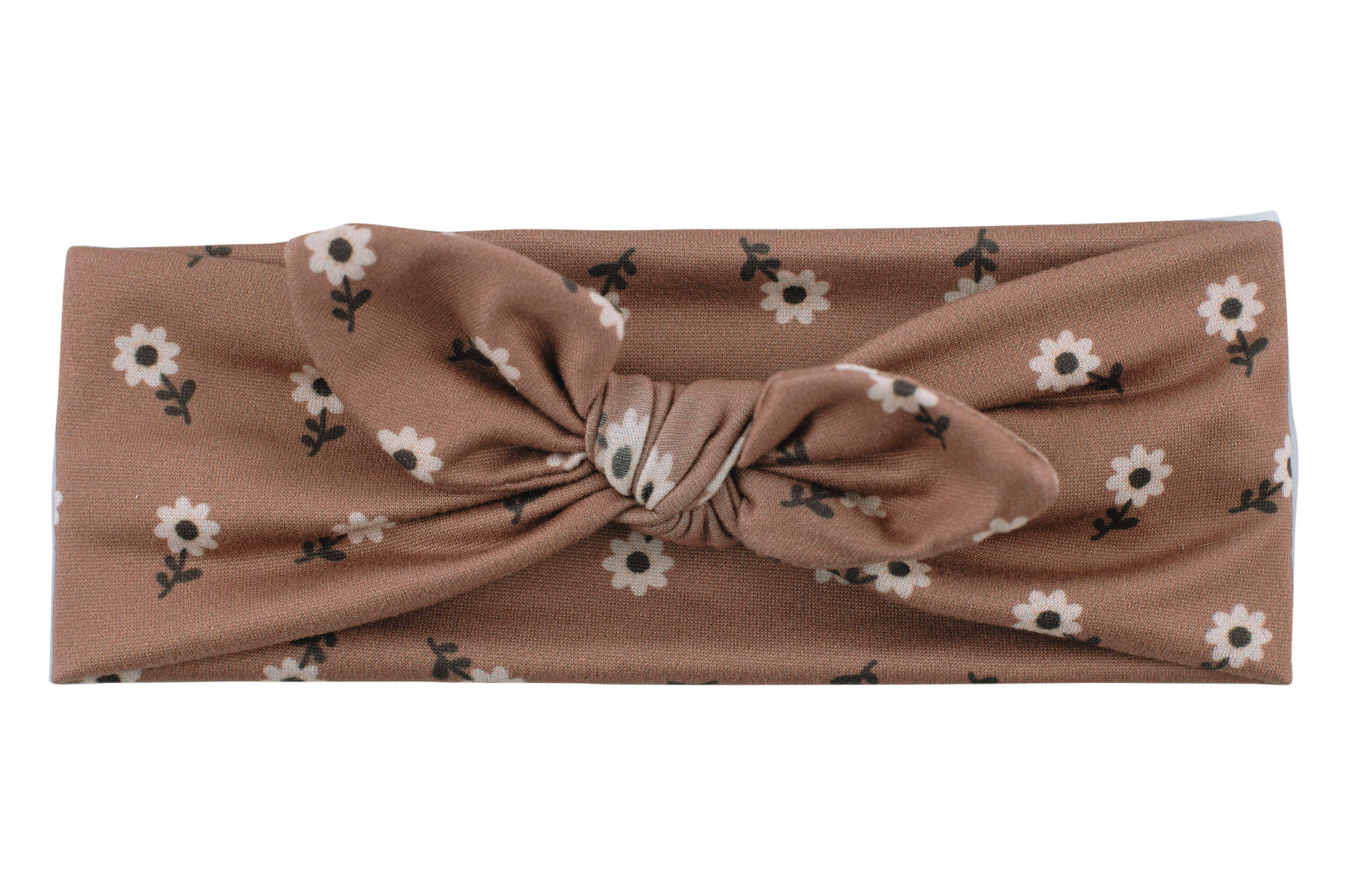 A comfortable baby head wrap featuring a floral pattern for little girls from By Bella Boutique. 