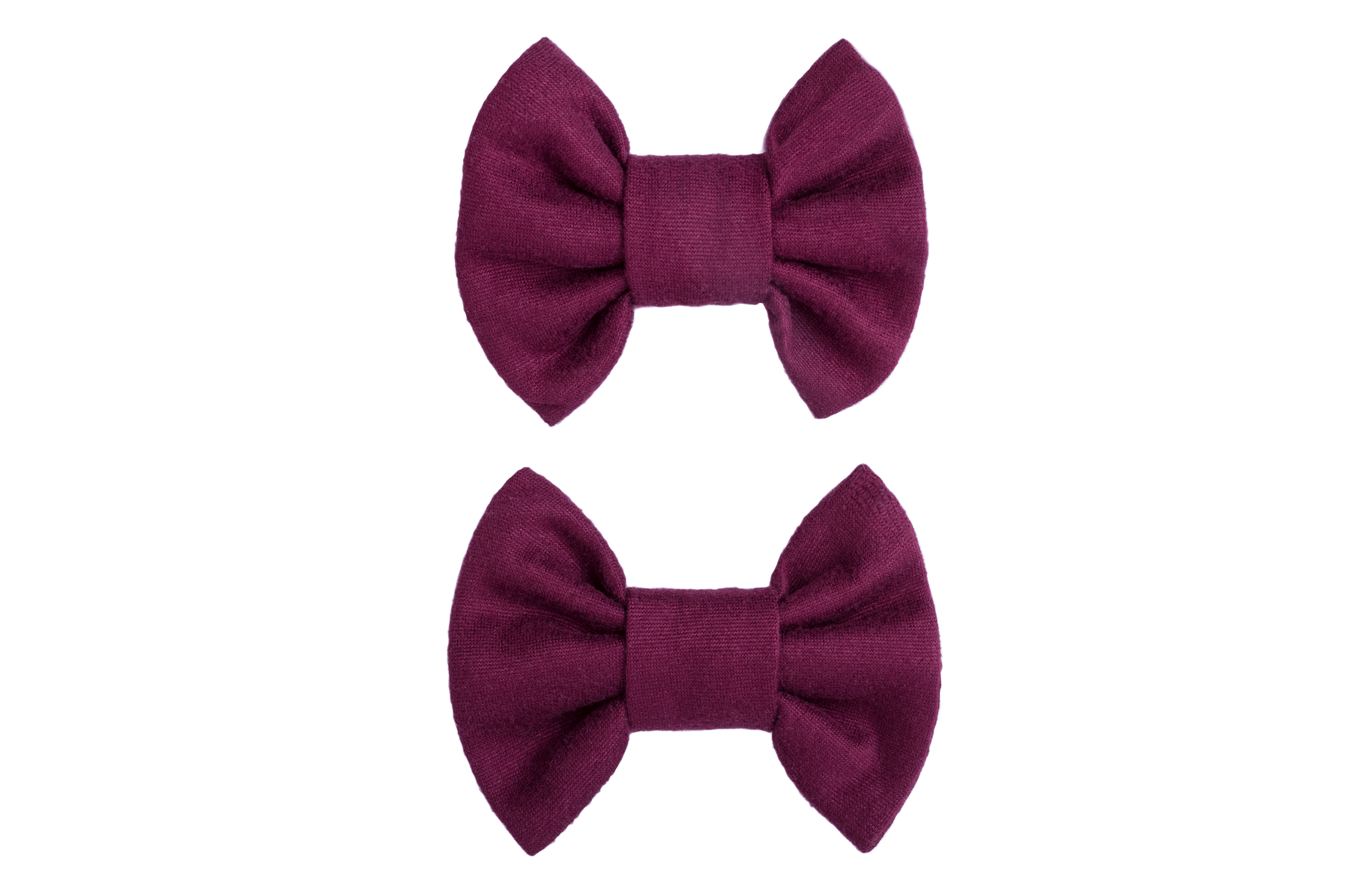 A set of two burgundy bow clips for toddler girls from By Bella Boutique.