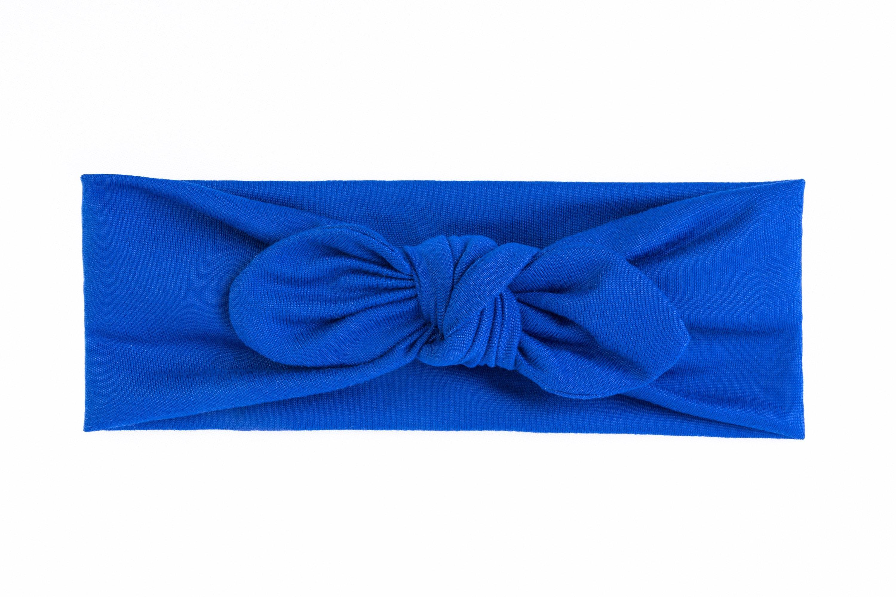 Handmade blue knotted headband for little girls from By Bella Boutique.