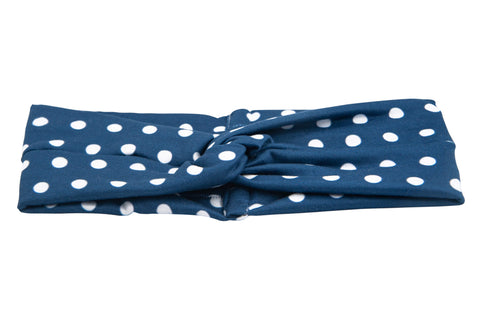 Blue polka dot twist headband for women from By Bella Boutique.