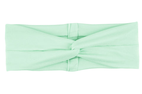 A green mommy and me matching headband from By Bella Boutique.