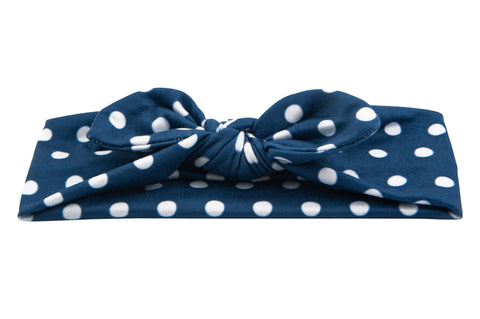 Blue polka dot headband for little girls from By Bella Boutique.