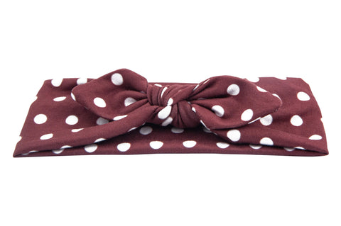 Brown polka dot print headwrap with bows for babies from By Bella Boutique.