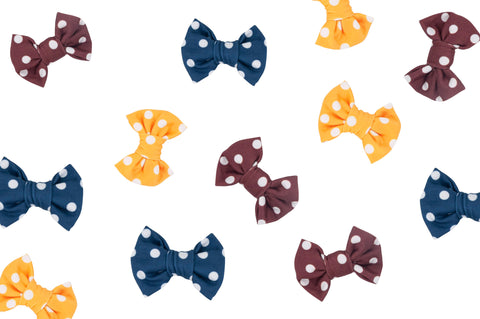A beautiful collection of bow clips for toddler girls. Available in a variety of three colors: blue polka dot, blue polka dot and brown polka dot.